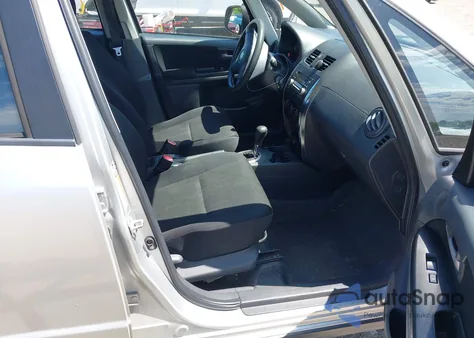 2010 Suzuki Sx4 Technology z USA, uszkodzony, nr VIN JS2YA5A37A6300161